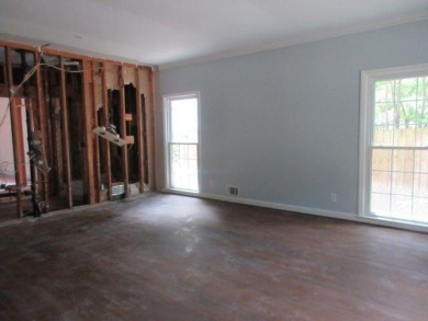 Beautiful spacious fixer upper in the heart of Buckhead.  This on Bobby Jones Golf Club in Georgia - for sale on GolfHomes.com, golf home, golf lot