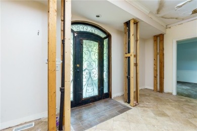 Beautiful spacious fixer upper in the heart of Buckhead.  This on Bobby Jones Golf Club in Georgia - for sale on GolfHomes.com, golf home, golf lot
