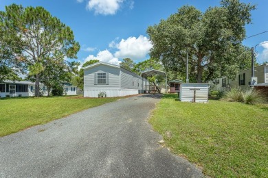 Home Sweet Coastal Home! Here is your next getaway or permanent on Quail Heights Golf and Country Club in Florida - for sale on GolfHomes.com, golf home, golf lot