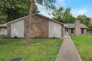 This fully remodeled home on a large, corner lot in an on Wright Park Municipal Golf Course in Texas - for sale on GolfHomes.com, golf home, golf lot