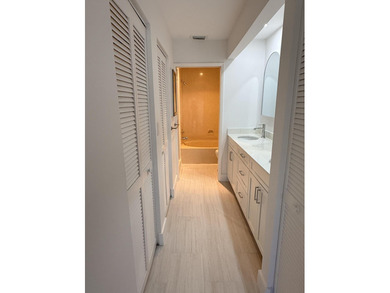 UPDATED 2ND FLOOR CONDO FEATURING WHITE EAT-IN KITCHEN WITH NEW on Boca Delray Golf and Country Club in Florida - for sale on GolfHomes.com, golf home, golf lot