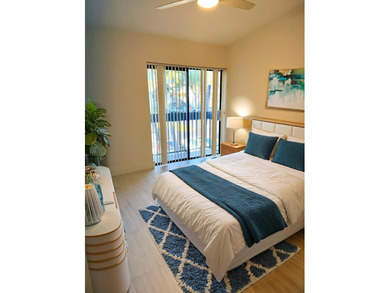 UPDATED 2ND FLOOR CONDO FEATURING WHITE EAT-IN KITCHEN WITH NEW on Boca Delray Golf and Country Club in Florida - for sale on GolfHomes.com, golf home, golf lot