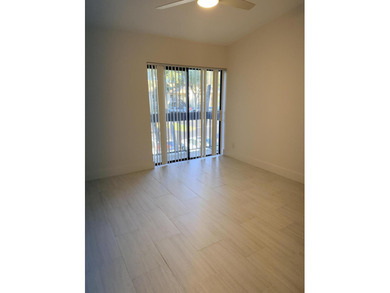 UPDATED 2ND FLOOR CONDO FEATURING WHITE EAT-IN KITCHEN WITH NEW on Boca Delray Golf and Country Club in Florida - for sale on GolfHomes.com, golf home, golf lot