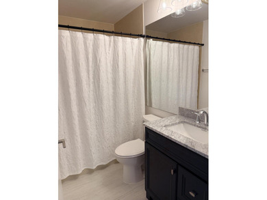 UPDATED 2ND FLOOR CONDO FEATURING WHITE EAT-IN KITCHEN WITH NEW on Boca Delray Golf and Country Club in Florida - for sale on GolfHomes.com, golf home, golf lot