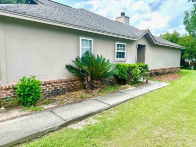 Check out this spacious three bed and two full bath condo in on Wedgefield Plantation Golf Club in South Carolina - for sale on GolfHomes.com, golf home, golf lot