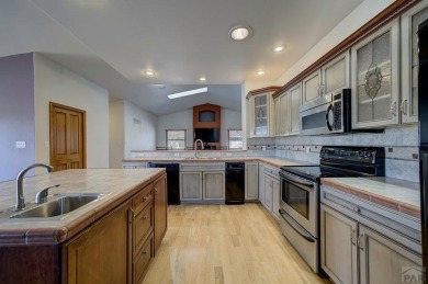 Right on the golf course! All new HVAC recently installed on Desert Hawk At Pueblo West in Colorado - for sale on GolfHomes.com, golf home, golf lot