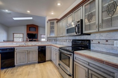 Right on the golf course! All new HVAC recently installed on Desert Hawk At Pueblo West in Colorado - for sale on GolfHomes.com, golf home, golf lot