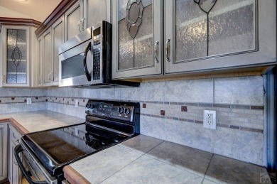Right on the golf course! All new HVAC recently installed on Desert Hawk At Pueblo West in Colorado - for sale on GolfHomes.com, golf home, golf lot