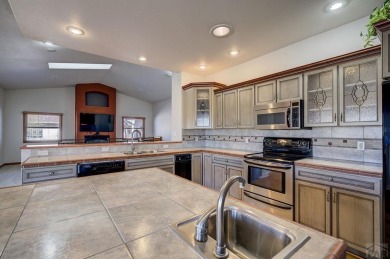 Right on the golf course! All new HVAC recently installed on Desert Hawk At Pueblo West in Colorado - for sale on GolfHomes.com, golf home, golf lot