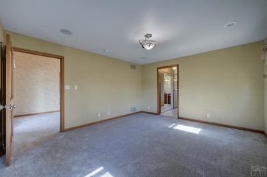 Right on the golf course! All new HVAC recently installed on Desert Hawk At Pueblo West in Colorado - for sale on GolfHomes.com, golf home, golf lot