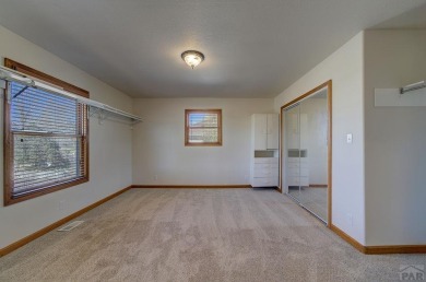 Right on the golf course! All new HVAC recently installed on Desert Hawk At Pueblo West in Colorado - for sale on GolfHomes.com, golf home, golf lot