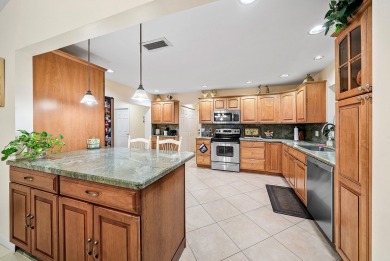 This premium water view residence offers 2,660 sq ft of living on Hunters Run Golf and Country Club in Florida - for sale on GolfHomes.com, golf home, golf lot