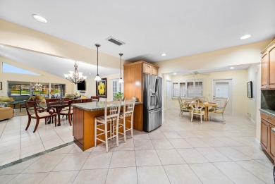 This premium water view residence offers 2,660 sq ft of living on Hunters Run Golf and Country Club in Florida - for sale on GolfHomes.com, golf home, golf lot