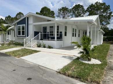 Welcome to your dream home in The Arbors at Countrywood, a on Golden Lakes Golf Course in Florida - for sale on GolfHomes.com, golf home, golf lot