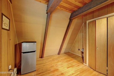 ESCAPE TO THE POCONO MOUNTAINS AND DISCOVER THIS CHARMING RUSTIC on Lords Valley Country Club, Inc in Pennsylvania - for sale on GolfHomes.com, golf home, golf lot