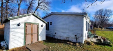 Nestled near Mille lacs lake, this charming year- round home on Izatys Golf and Yacht Club in Minnesota - for sale on GolfHomes.com, golf home, golf lot