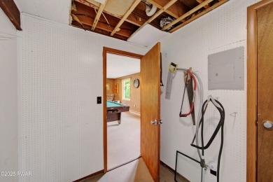 ESCAPE TO THE POCONO MOUNTAINS AND DISCOVER THIS CHARMING RUSTIC on Lords Valley Country Club, Inc in Pennsylvania - for sale on GolfHomes.com, golf home, golf lot