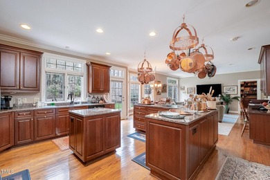 Welcome to a truly exceptional residence, nestled on over an on Governors Club in North Carolina - for sale on GolfHomes.com, golf home, golf lot