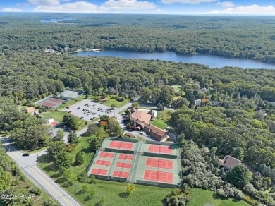 ESCAPE TO THE POCONO MOUNTAINS AND DISCOVER THIS CHARMING RUSTIC on Lords Valley Country Club, Inc in Pennsylvania - for sale on GolfHomes.com, golf home, golf lot