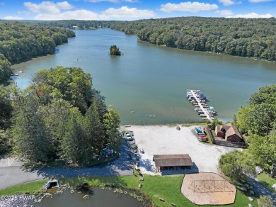 ESCAPE TO THE POCONO MOUNTAINS AND DISCOVER THIS CHARMING RUSTIC on Lords Valley Country Club, Inc in Pennsylvania - for sale on GolfHomes.com, golf home, golf lot