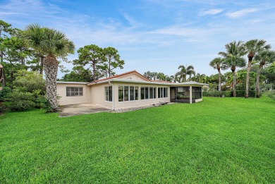 This premium water view residence offers 2,660 sq ft of living on Hunters Run Golf and Country Club in Florida - for sale on GolfHomes.com, golf home, golf lot