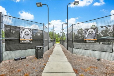 This beautifully maintained 3-bedroom, 2-bathroom residence on Savannah Quarters Country Club in Georgia - for sale on GolfHomes.com, golf home, golf lot