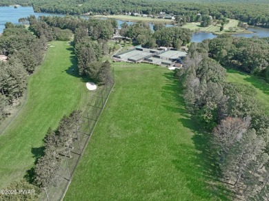ESCAPE TO THE POCONO MOUNTAINS AND DISCOVER THIS CHARMING RUSTIC on Lords Valley Country Club, Inc in Pennsylvania - for sale on GolfHomes.com, golf home, golf lot