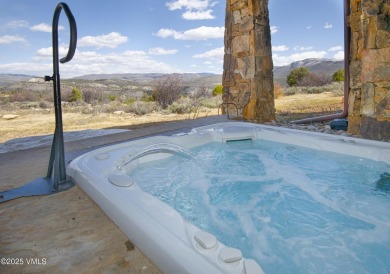 Experience refined mountain living at 233 Wildflower Lane -- a on Red Sky Ranch and Golf Club in Colorado - for sale on GolfHomes.com, golf home, golf lot