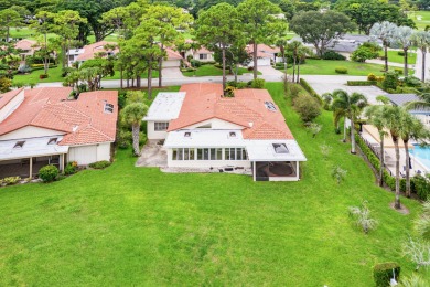 This premium water view residence offers 2,660 sq ft of living on Hunters Run Golf and Country Club in Florida - for sale on GolfHomes.com, golf home, golf lot