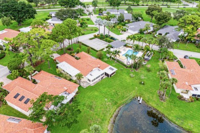 This premium water view residence offers 2,660 sq ft of living on Hunters Run Golf and Country Club in Florida - for sale on GolfHomes.com, golf home, golf lot