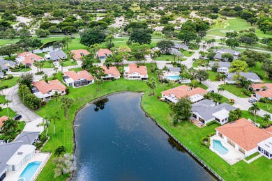 This premium water view residence offers 2,660 sq ft of living on Hunters Run Golf and Country Club in Florida - for sale on GolfHomes.com, golf home, golf lot