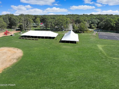 ESCAPE TO THE POCONO MOUNTAINS AND DISCOVER THIS CHARMING RUSTIC on Lords Valley Country Club, Inc in Pennsylvania - for sale on GolfHomes.com, golf home, golf lot