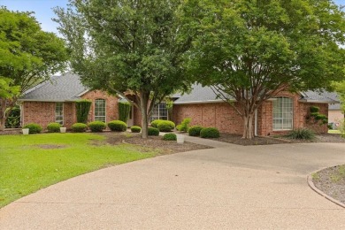 Discover your dream home nestled in coveted Pecan Plantation on Pecan Plantation Country Club in Texas - for sale on GolfHomes.com, golf home, golf lot