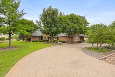Discover your dream home nestled in coveted Pecan Plantation on Pecan Plantation Country Club in Texas - for sale on GolfHomes.com, golf home, golf lot