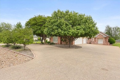 Discover your dream home nestled in coveted Pecan Plantation on Pecan Plantation Country Club in Texas - for sale on GolfHomes.com, golf home, golf lot