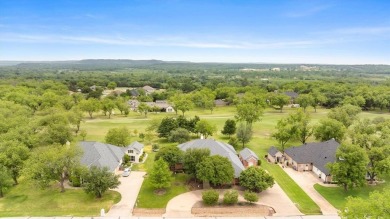 Discover your dream home nestled in coveted Pecan Plantation on Pecan Plantation Country Club in Texas - for sale on GolfHomes.com, golf home, golf lot