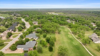 Discover your dream home nestled in coveted Pecan Plantation on Pecan Plantation Country Club in Texas - for sale on GolfHomes.com, golf home, golf lot