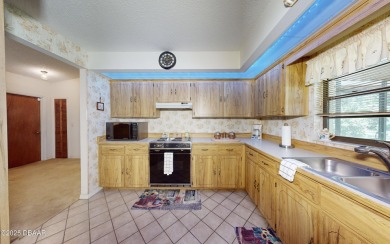 Charming Mariani Built Home in Desirable Pine Lakes Subdivision! on The Grand Club - Pine Lakes Course in Florida - for sale on GolfHomes.com, golf home, golf lot