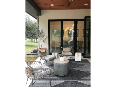 Stylish Hill Country contemporary home backing up to the #1 tee on Apple Rock Golf Course - Horseshoe Bay in Texas - for sale on GolfHomes.com, golf home, golf lot