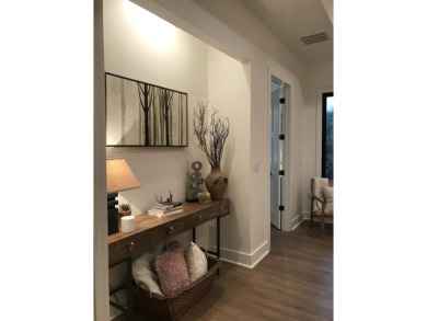 Stylish Hill Country contemporary home backing up to the #1 tee on Apple Rock Golf Course - Horseshoe Bay in Texas - for sale on GolfHomes.com, golf home, golf lot