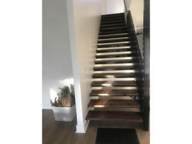 Stylish Hill Country contemporary home backing up to the #1 tee on Apple Rock Golf Course - Horseshoe Bay in Texas - for sale on GolfHomes.com, golf home, golf lot