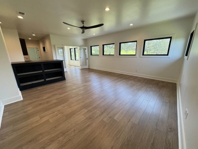 Stylish Hill Country contemporary home backing up to the #1 tee on Apple Rock Golf Course - Horseshoe Bay in Texas - for sale on GolfHomes.com, golf home, golf lot
