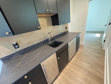 Stylish Hill Country contemporary home backing up to the #1 tee on Apple Rock Golf Course - Horseshoe Bay in Texas - for sale on GolfHomes.com, golf home, golf lot
