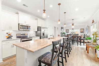 Live close to multiple beaches in a gated community loaded with on Brunswick Plantation and Golf Resorts in North Carolina - for sale on GolfHomes.com, golf home, golf lot