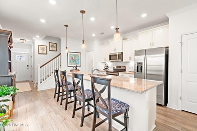 Live close to multiple beaches in a gated community loaded with on Brunswick Plantation and Golf Resorts in North Carolina - for sale on GolfHomes.com, golf home, golf lot