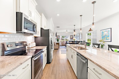 Live close to multiple beaches in a gated community loaded with on Brunswick Plantation and Golf Resorts in North Carolina - for sale on GolfHomes.com, golf home, golf lot