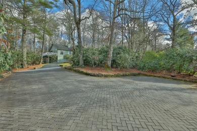 This beautifully updated home is located in the desirable on Highlands Falls Country Club in North Carolina - for sale on GolfHomes.com, golf home, golf lot