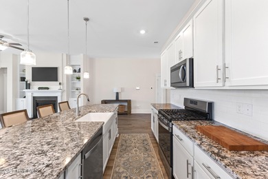 Located in the sought-after Heron Pointe neighborhood of on Cape Fear National At Brunswick Forest in North Carolina - for sale on GolfHomes.com, golf home, golf lot