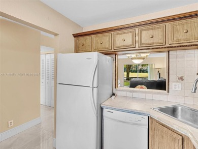 This 2 bedroom, 2 bath condo is perfectly situated on the first on Colony West Country Club in Florida - for sale on GolfHomes.com, golf home, golf lot
