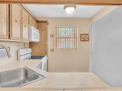 This 2 bedroom, 2 bath condo is perfectly situated on the first on Colony West Country Club in Florida - for sale on GolfHomes.com, golf home, golf lot
